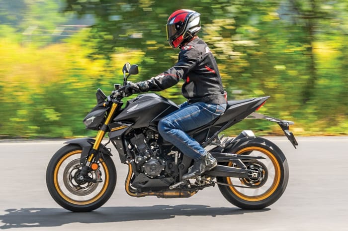 Honda CB1000 Hornet SP left side profile riding shot on road